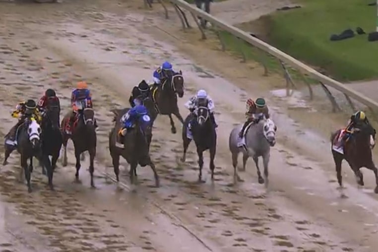 Brad Cox's three-year-old filly Margie's Intention takes the lead down the final stretch to cross the wire first in the Black-Eyed Susan Stakes.